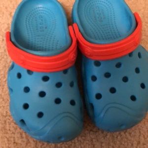 2 pairs size 10 crocs.